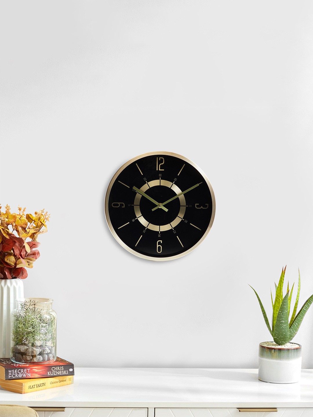 

Home Centre Gold-Toned & Black Round Shape Analogue Wall Clock