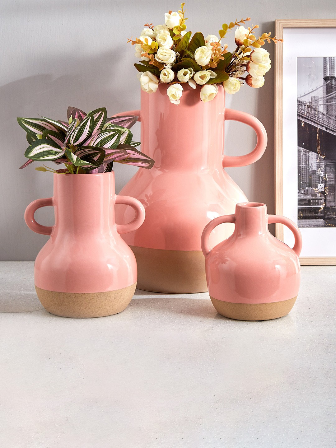 

Home Centre Peach-Coloured Ceramic Vase With Handle