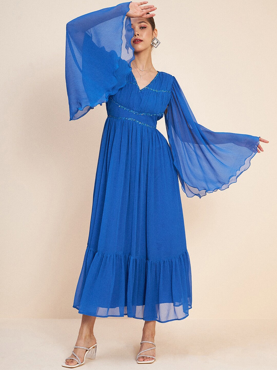 

Antheaa Blue V-Neck Slit Sleeves Embellished Detail Maxi Dress