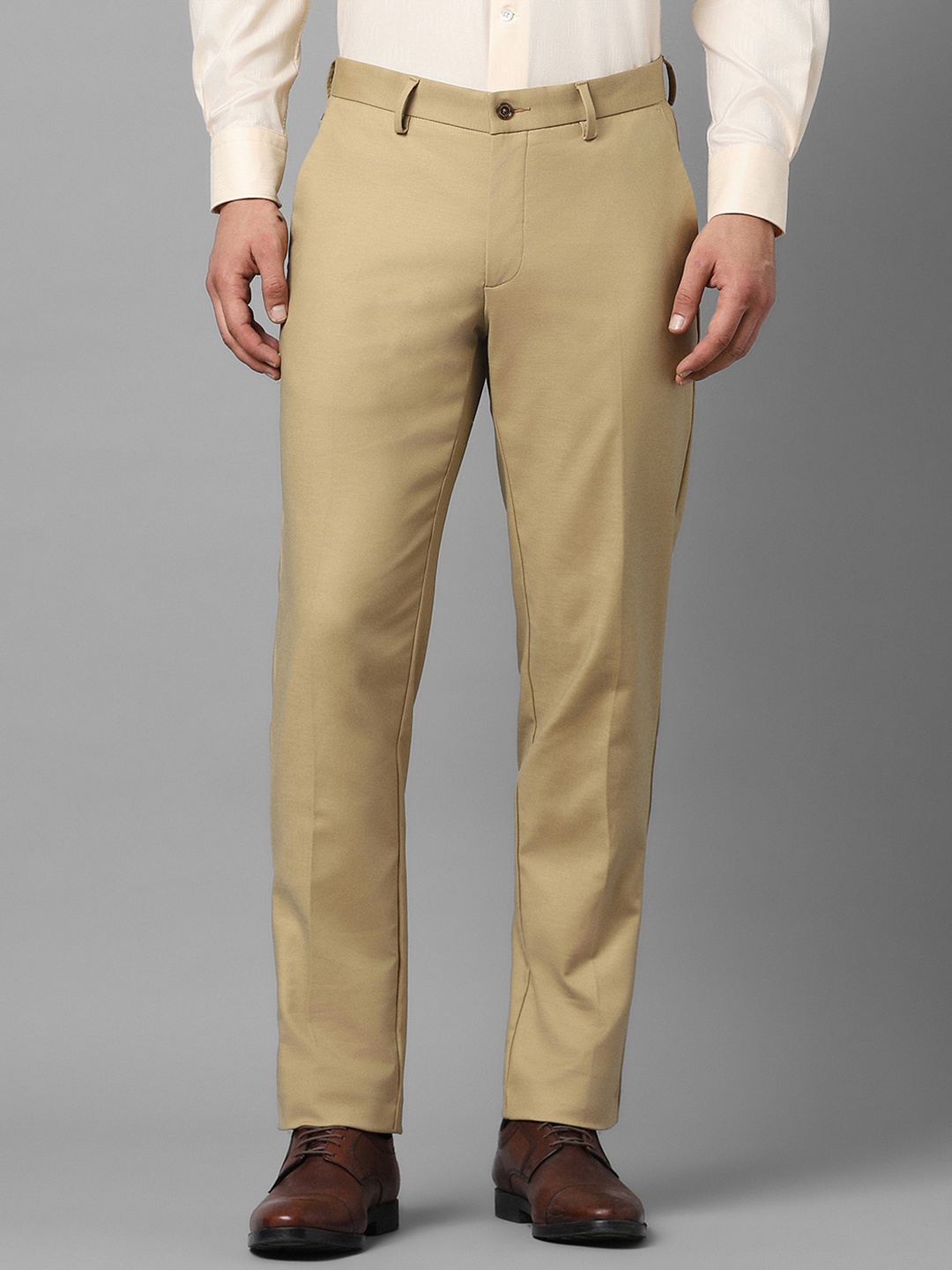 

Louis Philippe Men Mid Rise Plain Slim Fit Formal Trousers, Beige