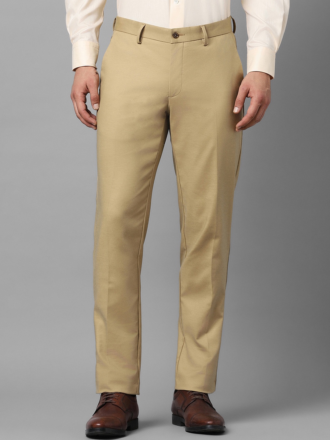 

Louis Philippe Men Mid Rise Plain Slim Fit Formal Trousers, Beige