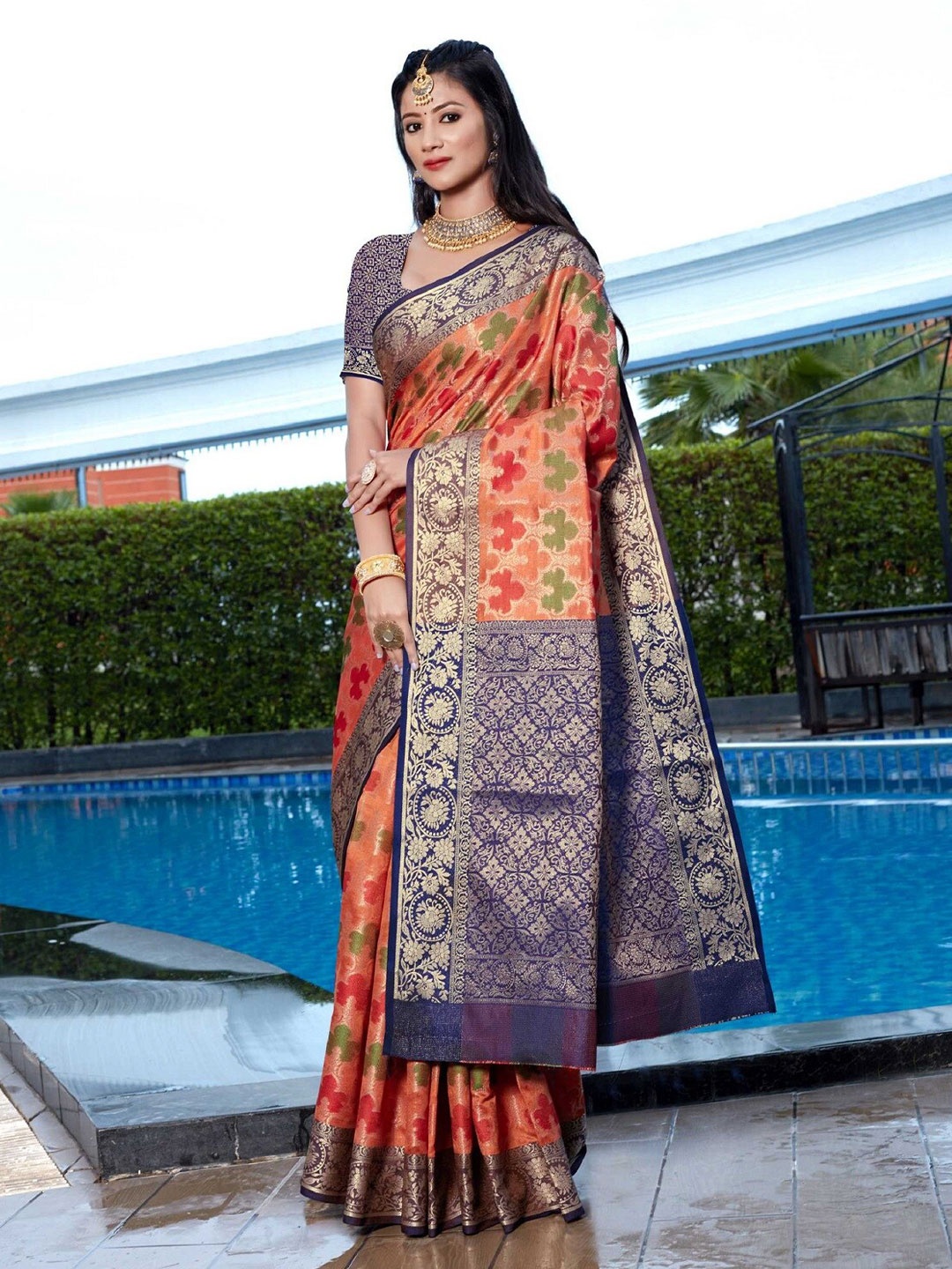 

Mitera Woven Design Zari Banarasi Saree, Orange
