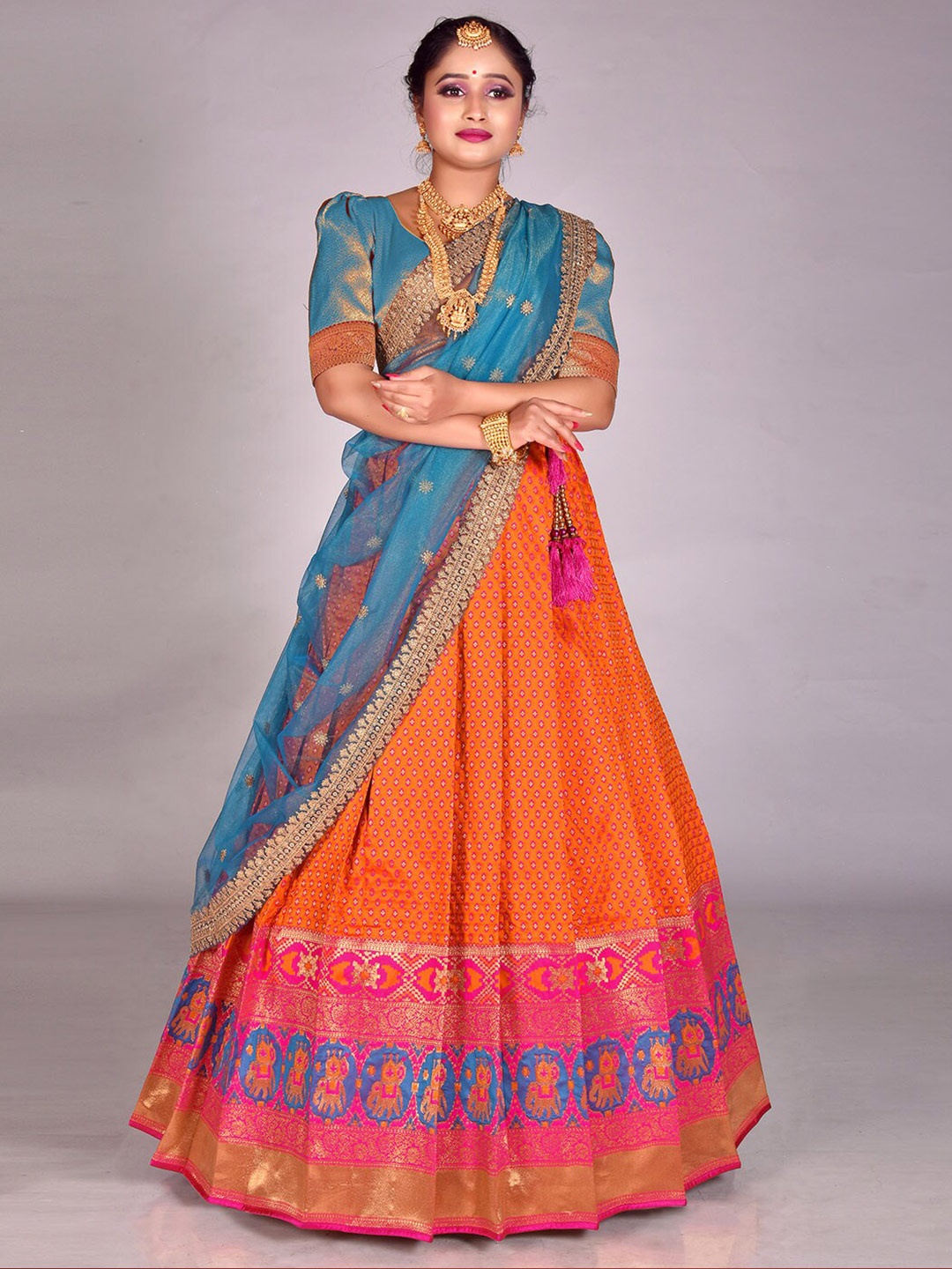 

HALFSAREE STUDIO Banarasi silk Semi-Stitched Lehenga & Unstitched Blouse With Dupatta, Orange