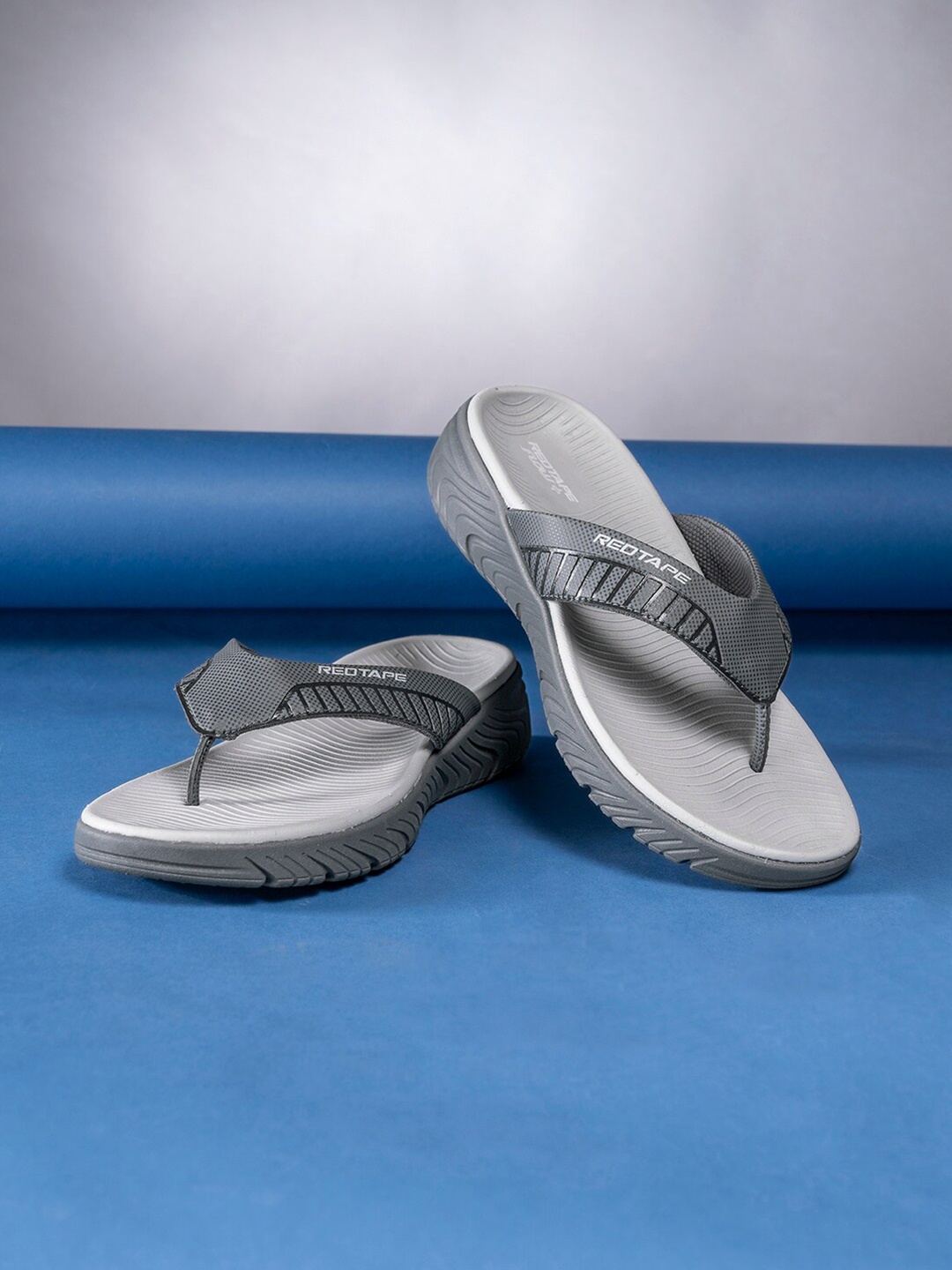 

Red Tape Men Self Design Thong Flip-Flops, Grey