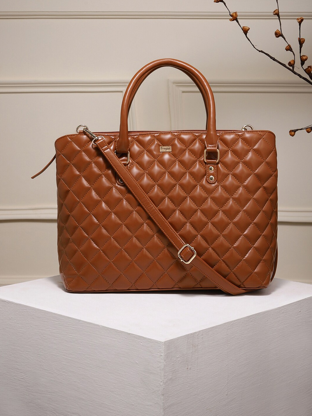 

Berrylush Women Brown Textured Laptop Bag With Quilted