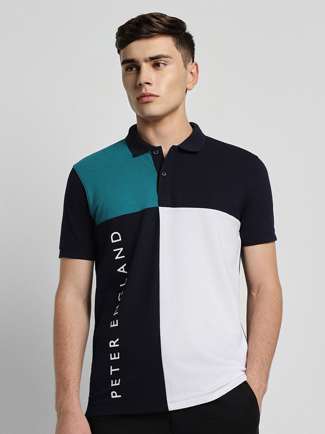 

Peter England Casuals Colourblocked Polo Collar Slim Fit Cotton T-Shirt, Black