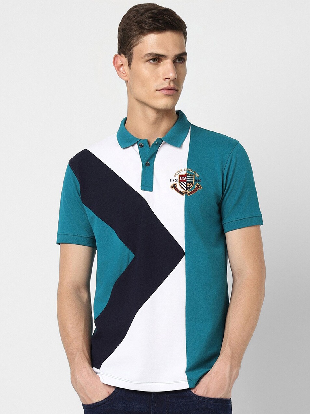 

Peter England Casuals Colourblocked Polo Collar Slim Fit T-shirt, Blue
