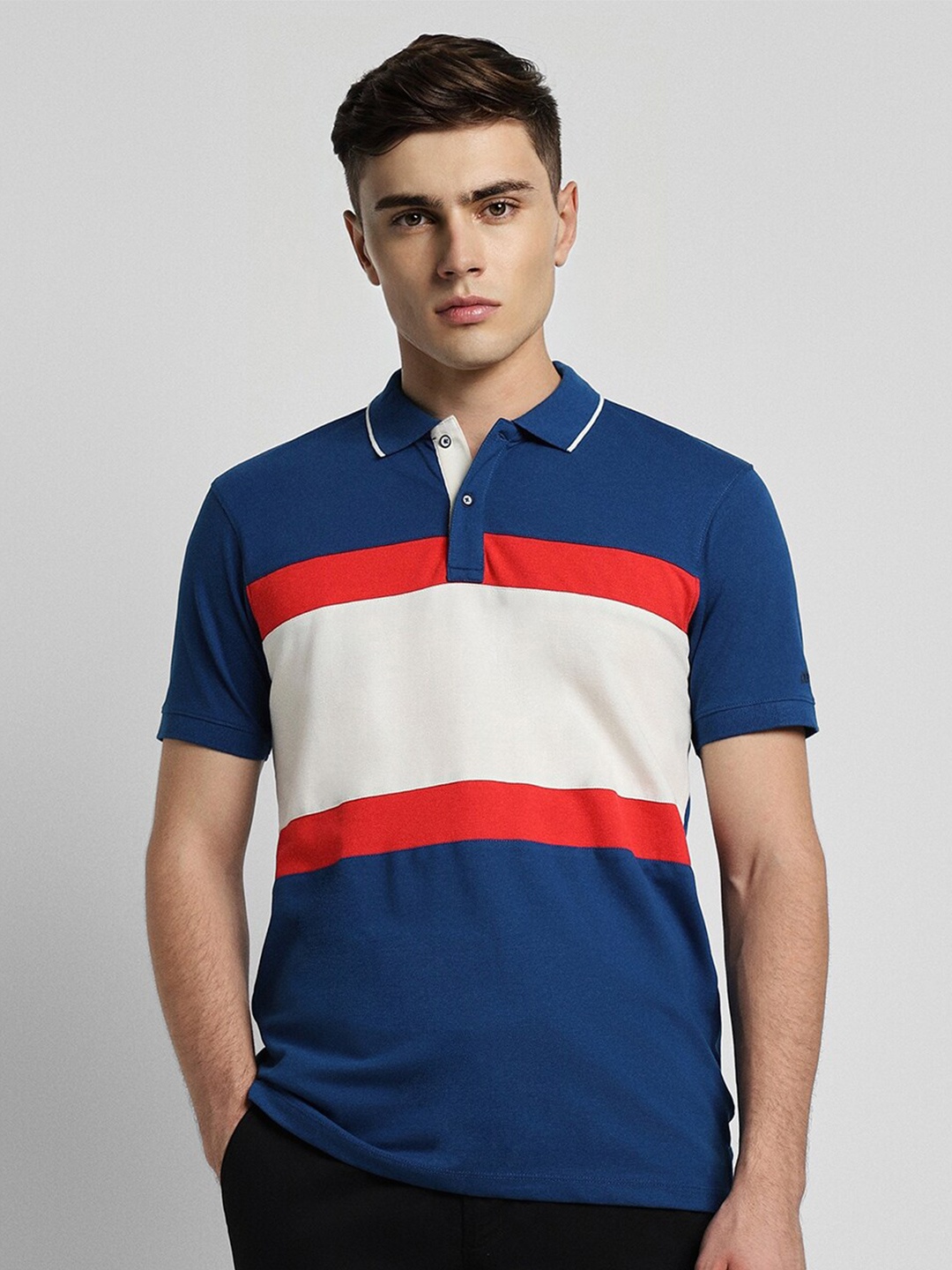 

Peter England Casuals Colourblocked Polo Collar Slim Fit T-shirt, Blue