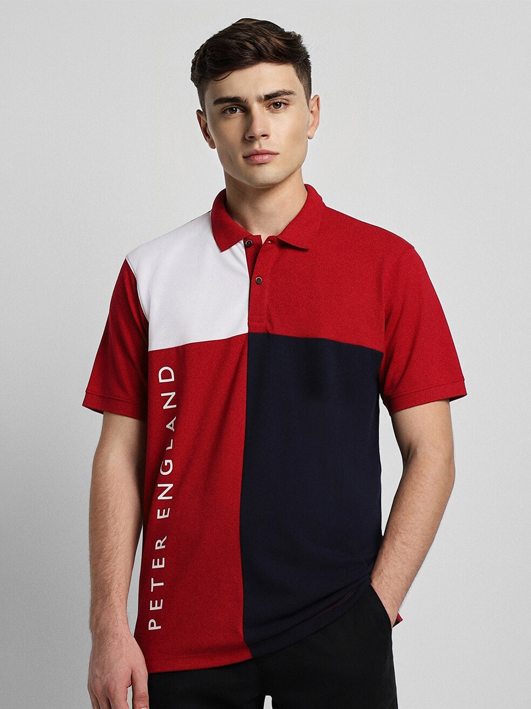 

Peter England Casuals Colourblocked Polo Collar Slim Fit Cotton T-Shirt, Red