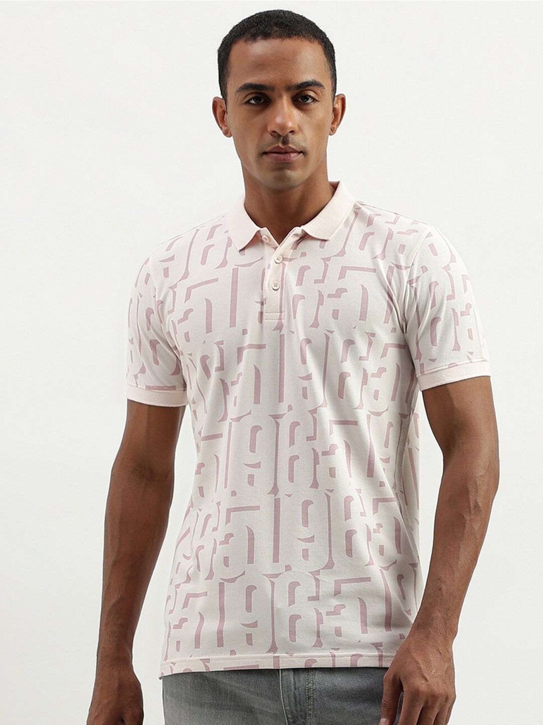 

United Colors of Benetton Abstract Printed Polo Collar T-shirt, Off white