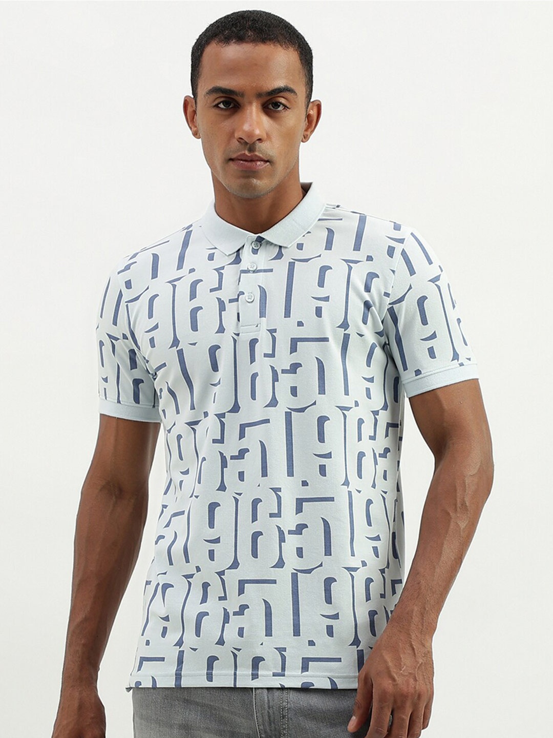 

United Colors of Benetton Abstract Printed Polo Collar T-shirt, Multi