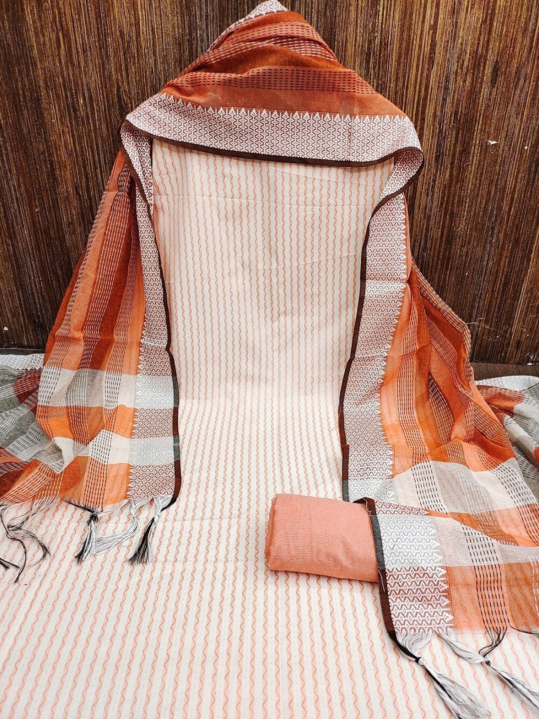 

APNISHA Striped Unstitched Dress Material, Orange