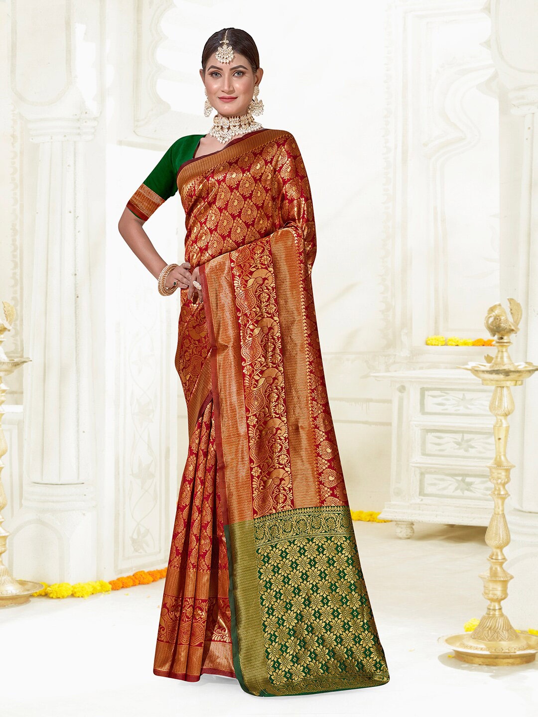 

Anouk Maroon & Green Ethnic Woven Design Zari Kanjeevaram Saree