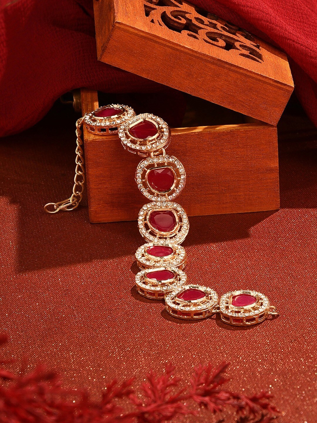 

Zaveri Pearls Gold Plated Stone Studded Link Bracelet