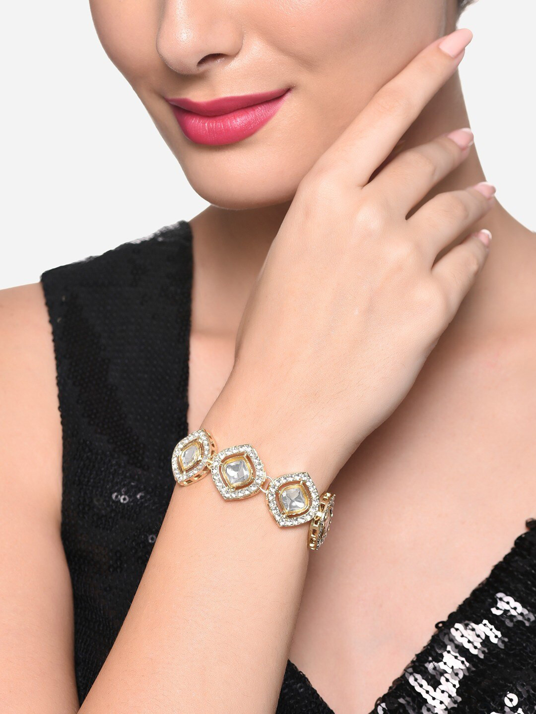 

Zaveri Pearls Gold Plated Austrian Diamonds Stone And Kundan Studded Link Bracelet