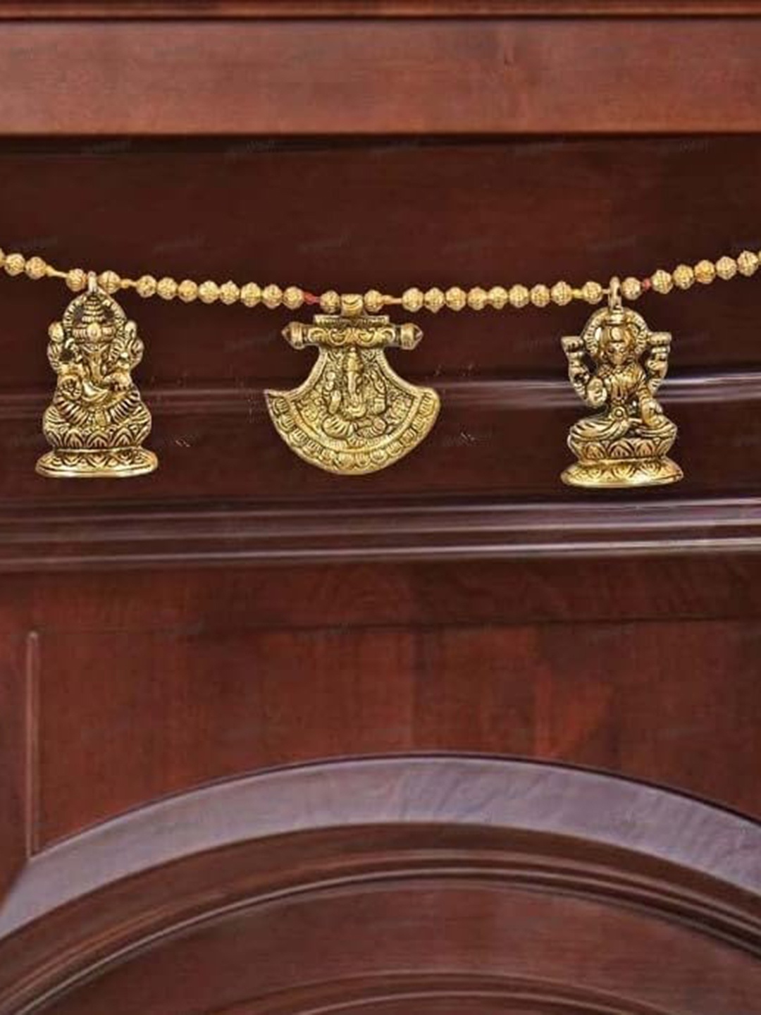 

Divyakosh Beige Metal Ganesha On Leaf Shub Labh Door Hanging Toran