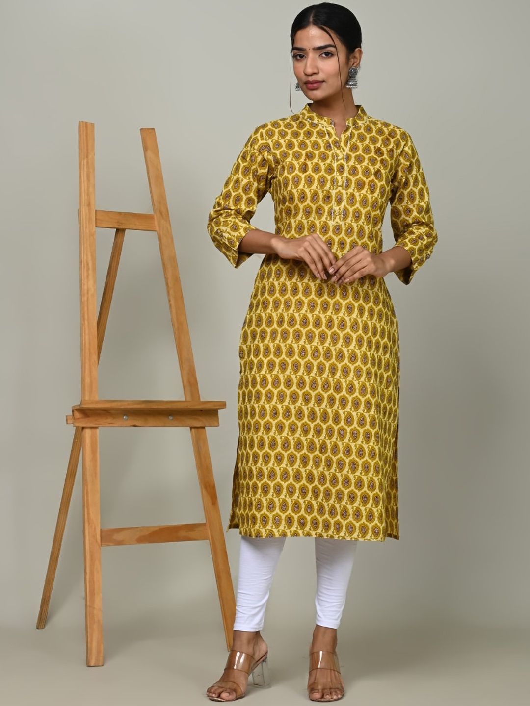 

Nishika Ethnic Motifs Printed Cotton Kurta, Yellow