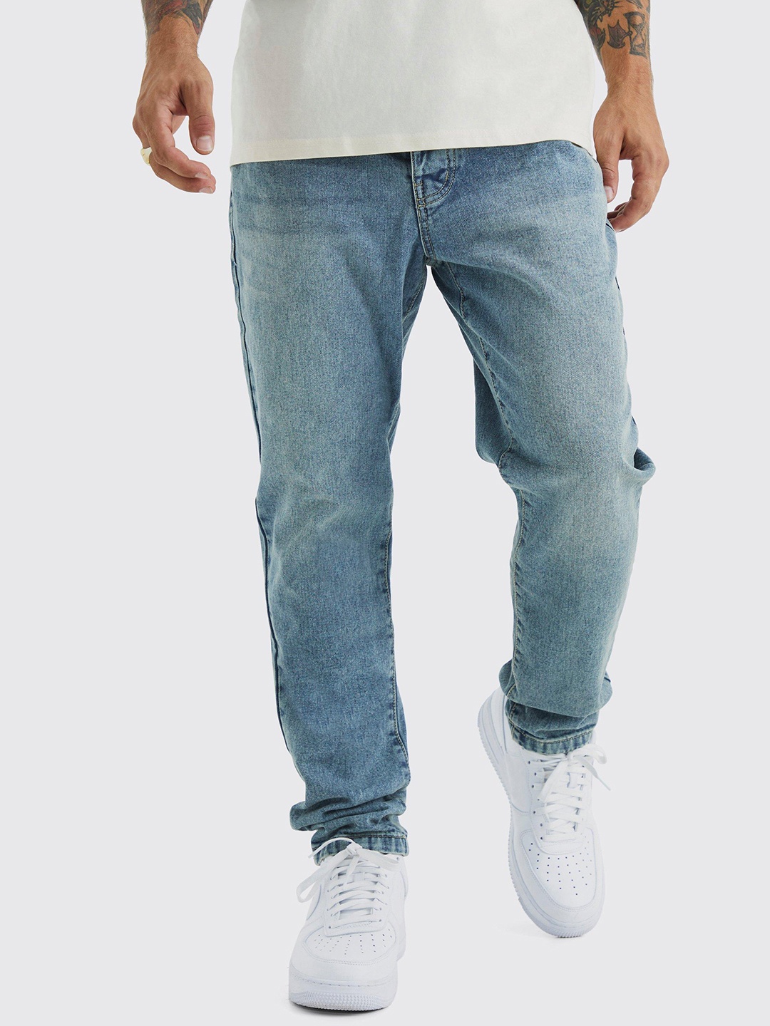 

boohooMAN Tapered Fit Jeans, Navy blue