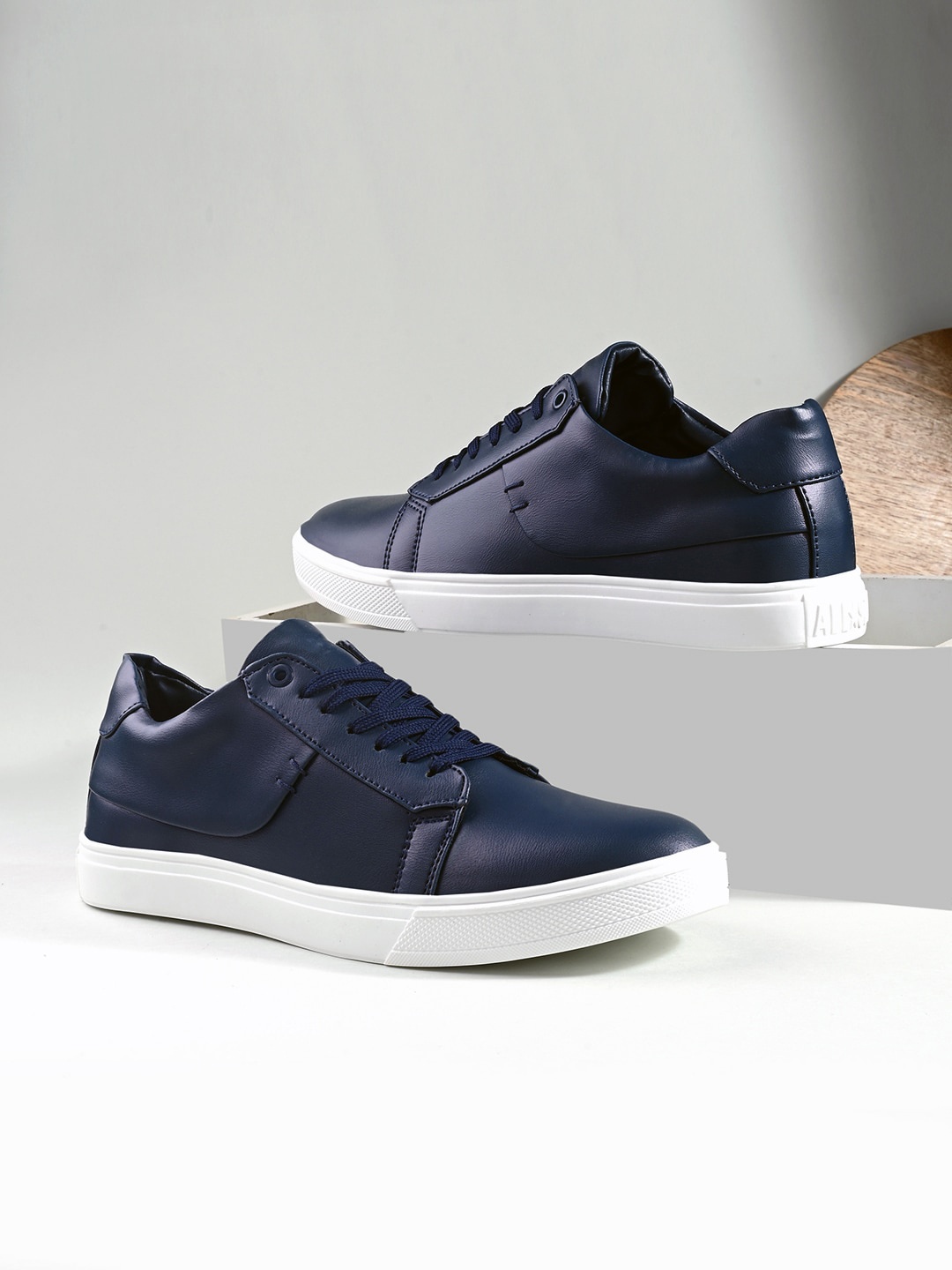 

The Roadster Lifestyle Co. Men Navy Blue Contrast Sole Sneakers