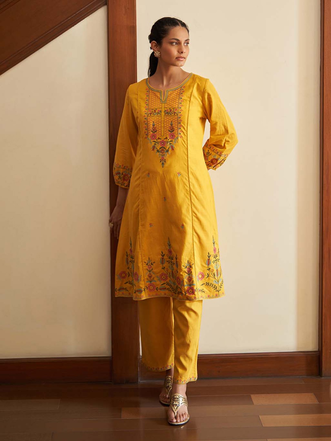 

Lakshita Ethnic Motifs Embroidered Sequinned Straight Kurta, Mustard