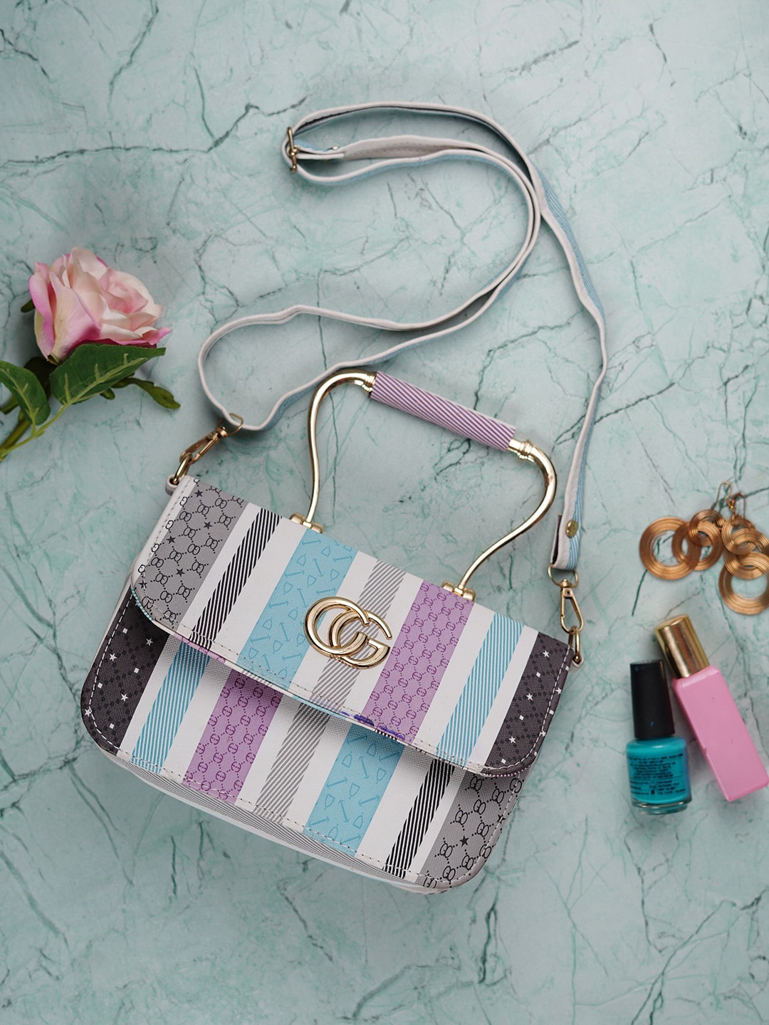 

CDI Printed Structured Sling Bag, Blue