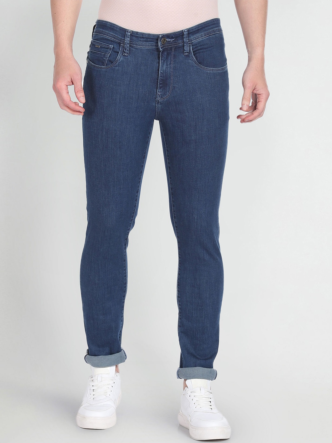 

Arrow Sport Men Slim Fit Mid-Rise Medium Shade Clean Look Jeans, Blue