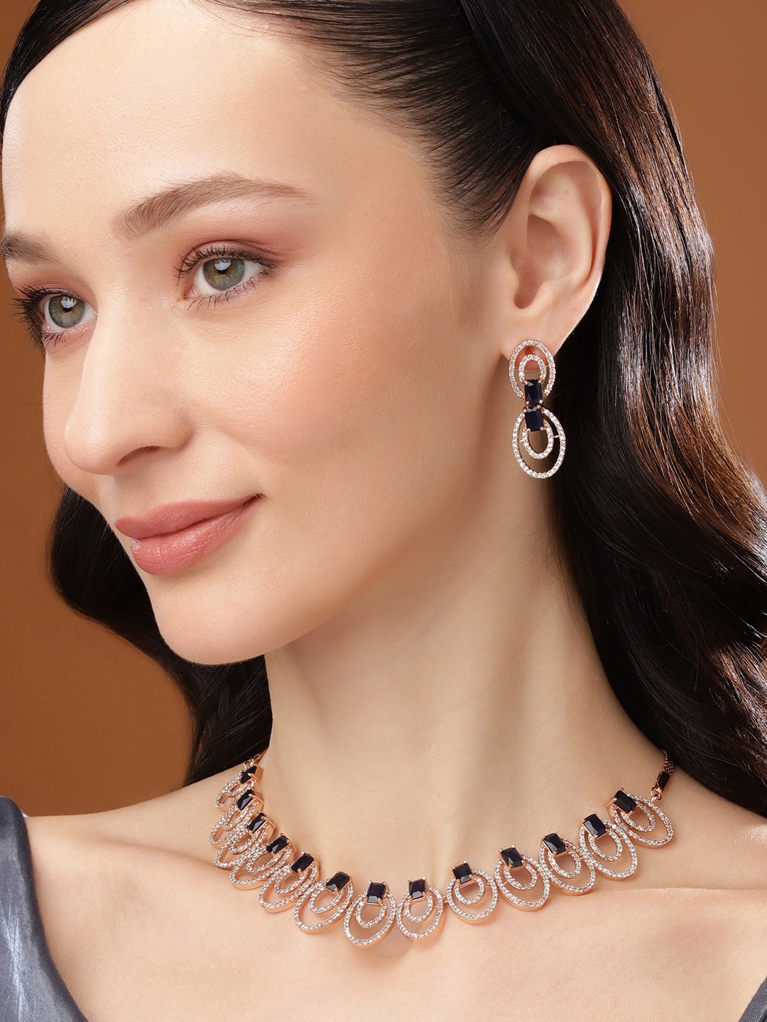 

Estele Rose Gold Plated CZ Circular Designer Necklace Set with Blue Crystals