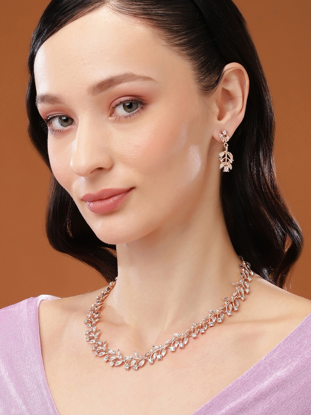 

Estele Rose Gold Plated Leaf Designer Necklace Set with Crystals