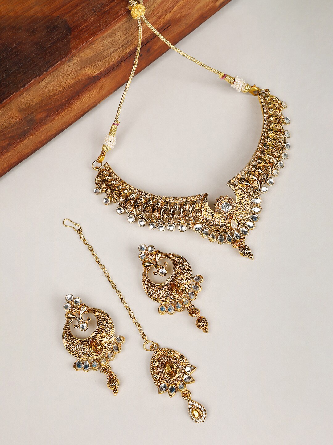 

ANIKAS CREATION Gold Plated Cubic Zirconia Sudded Jewellery Set