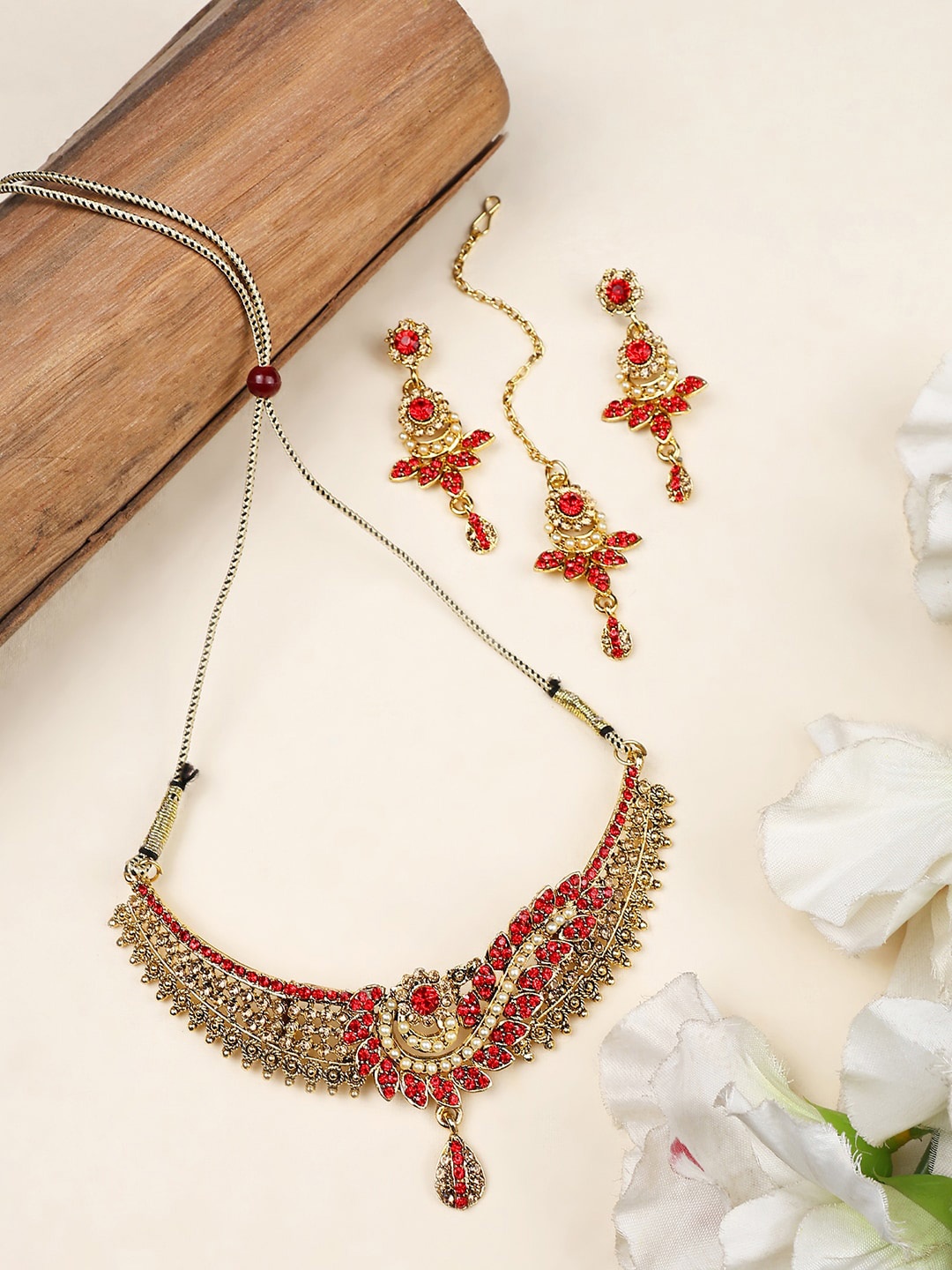 

ANIKAS CREATION Gold Plated Cubic Zirconia Studded Jewellery Set