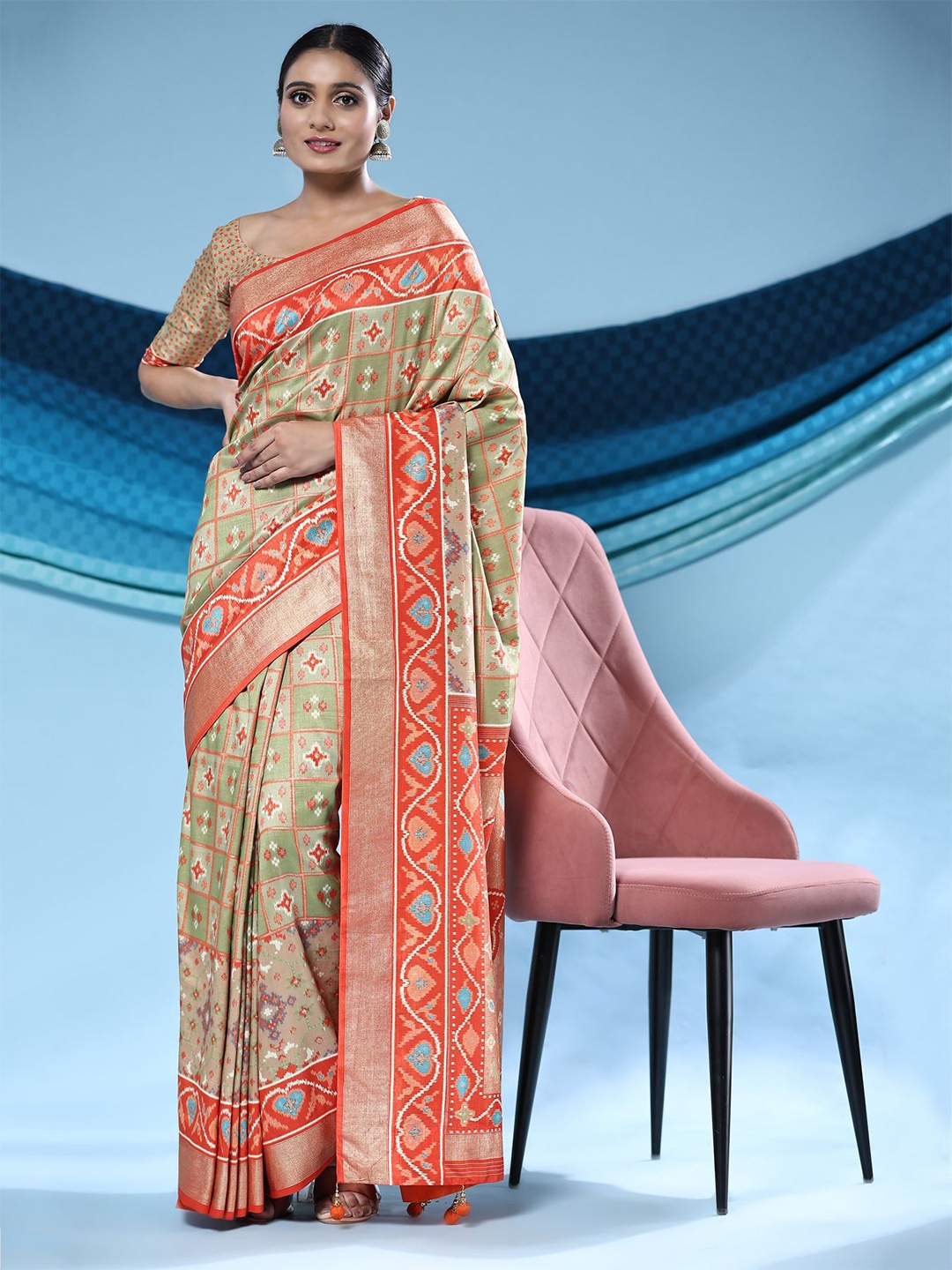 

Phenav Ethnic Motifs Printed Zari Patola Saree, Sea green