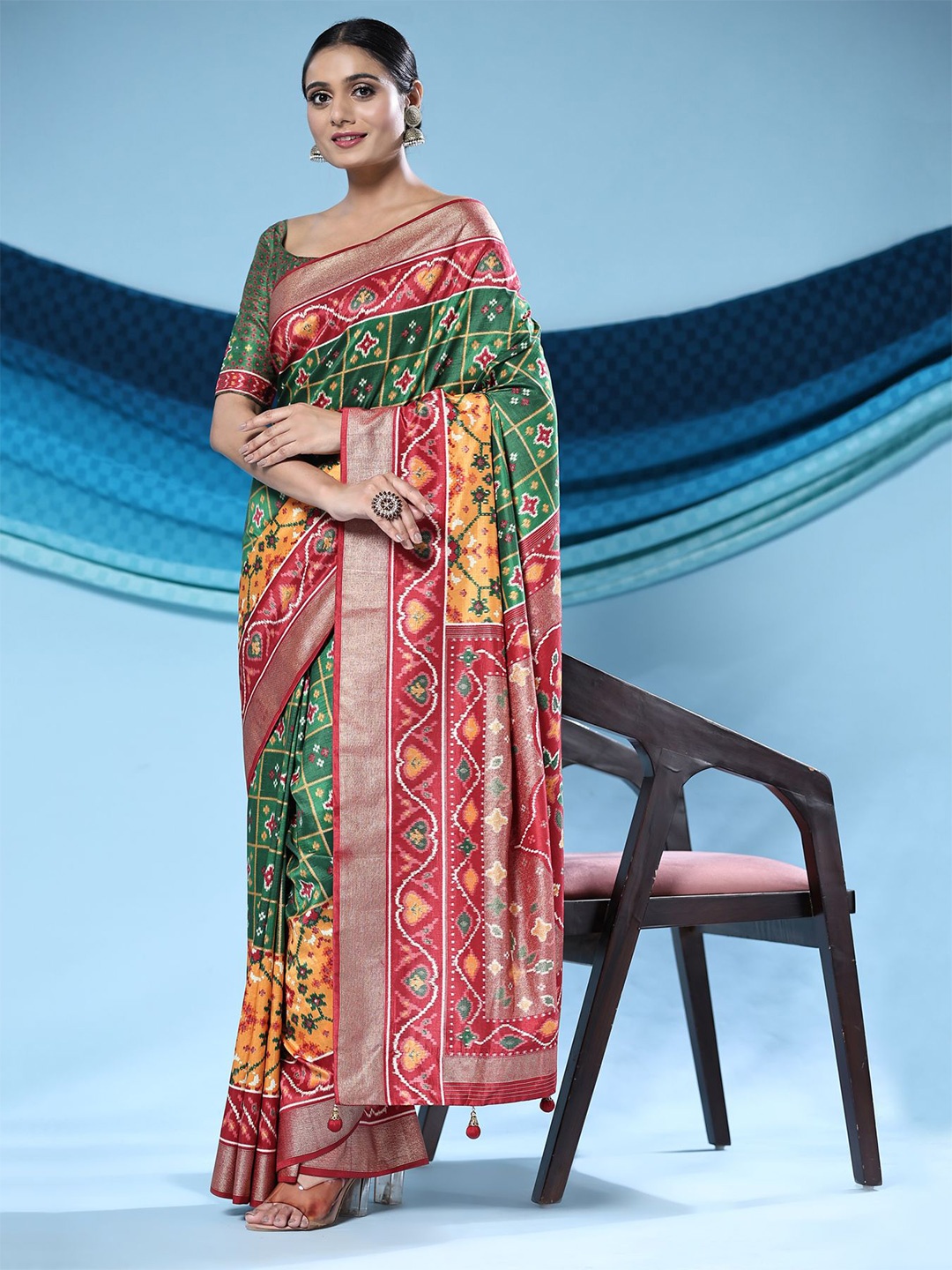 

Phenav Ethnic Motifs Zari Patola Saree, Green