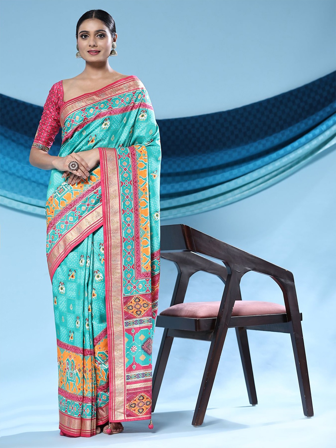 

Phenav Turquoise Ethnic Motifs Zari Patola Saree, Turquoise blue