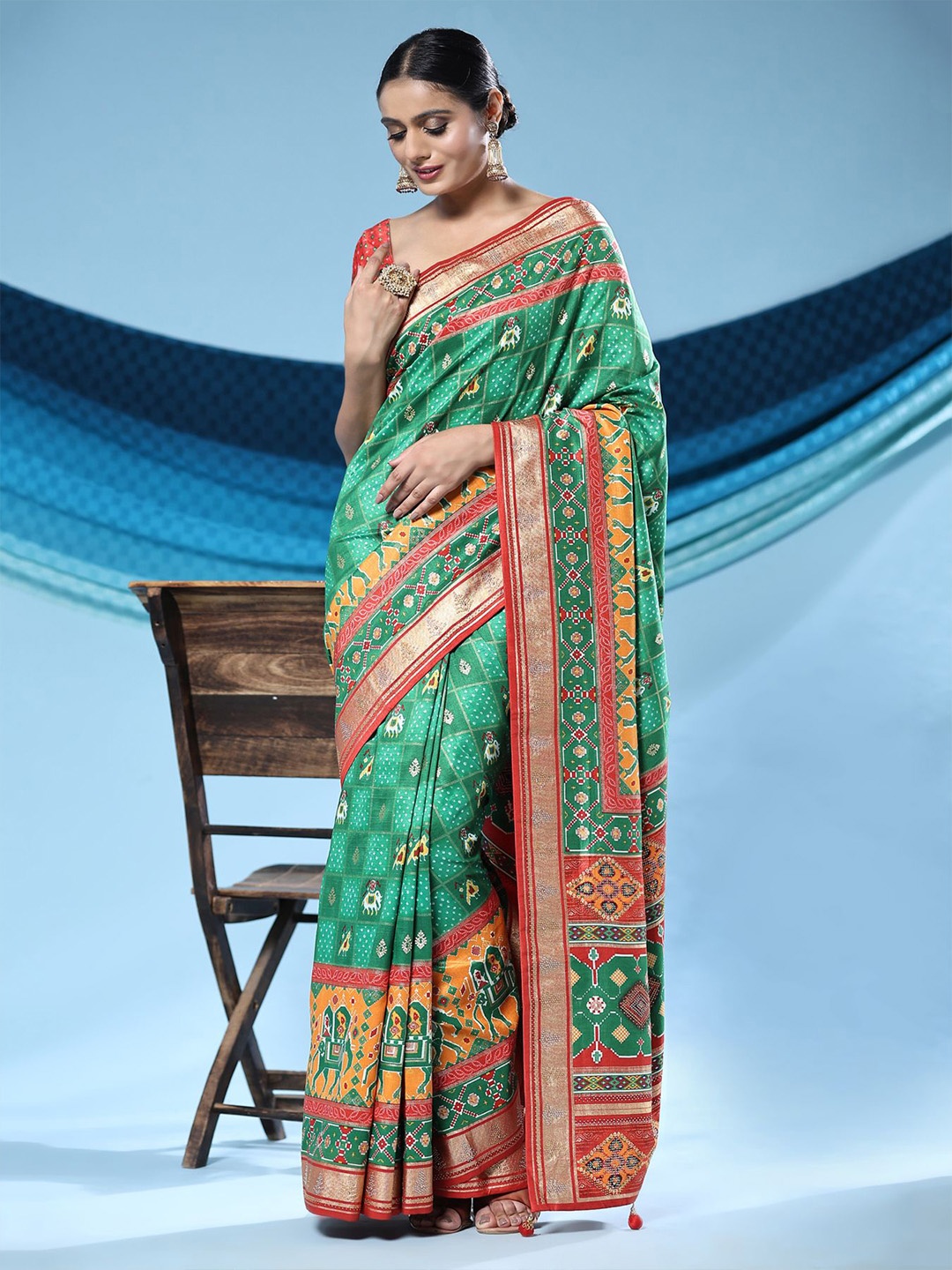 

Phenav Ethnic Motifs Zari Silk Blend Patola Saree, Green
