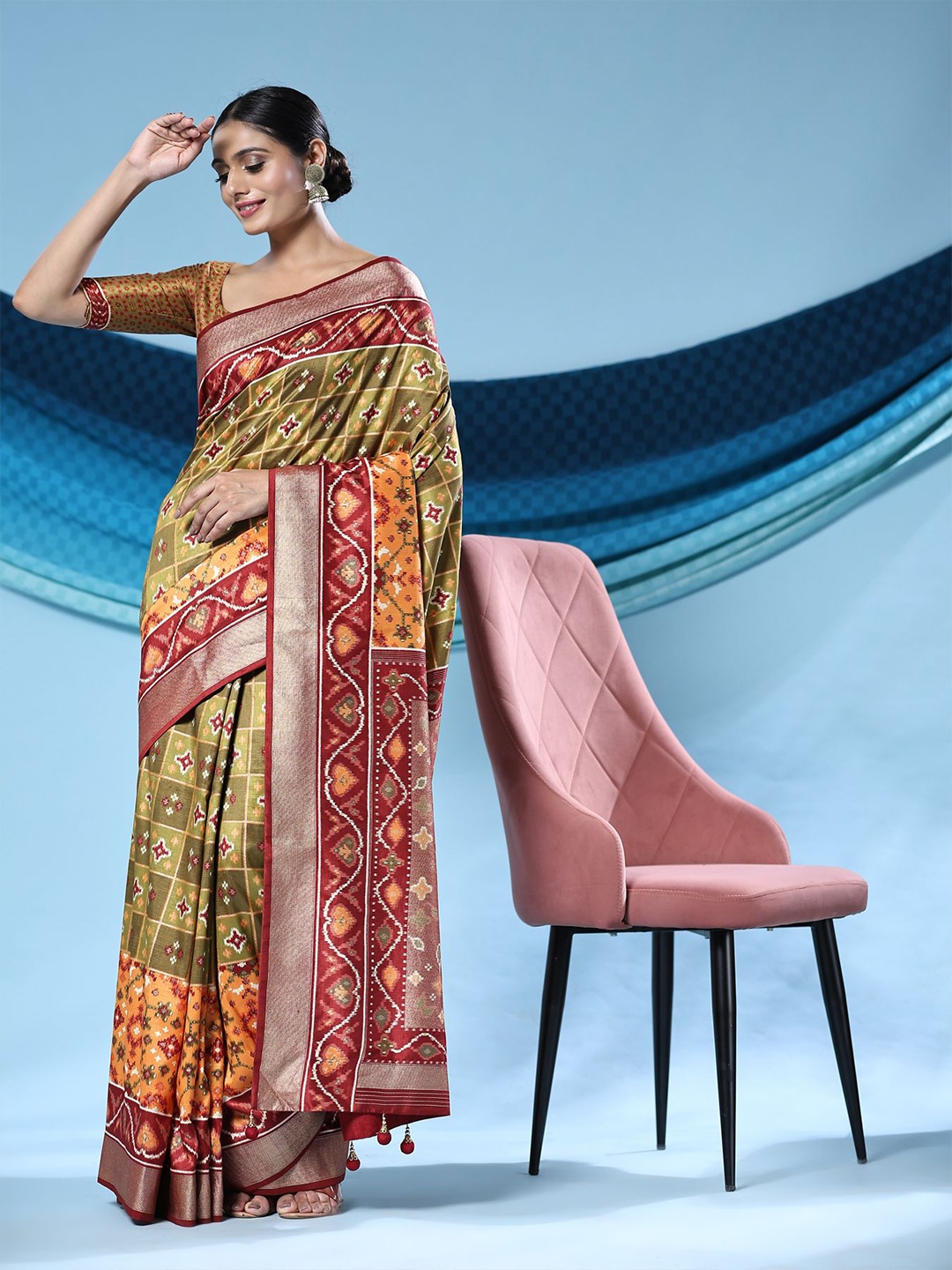 

Phenav Ethnic Motifs Printed Zari Patola Saree, Green