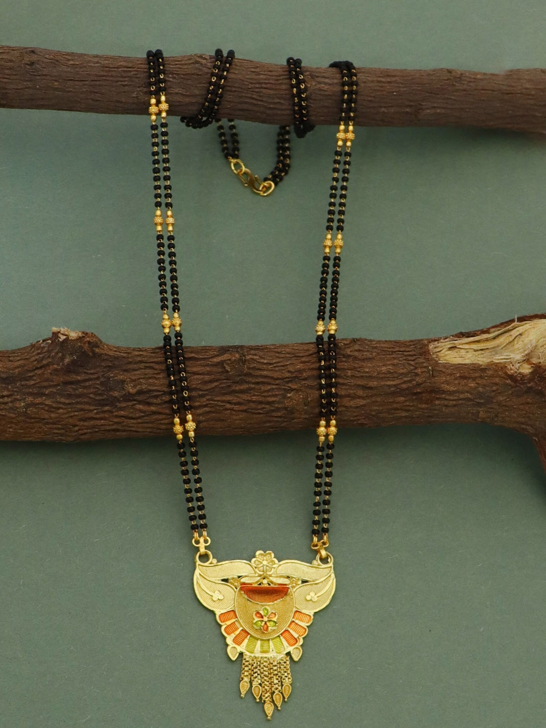 

Ramdev Art Fashion Jwellery Gold-Plated Stones-Studded & Beads-Beaded Mangalsutra