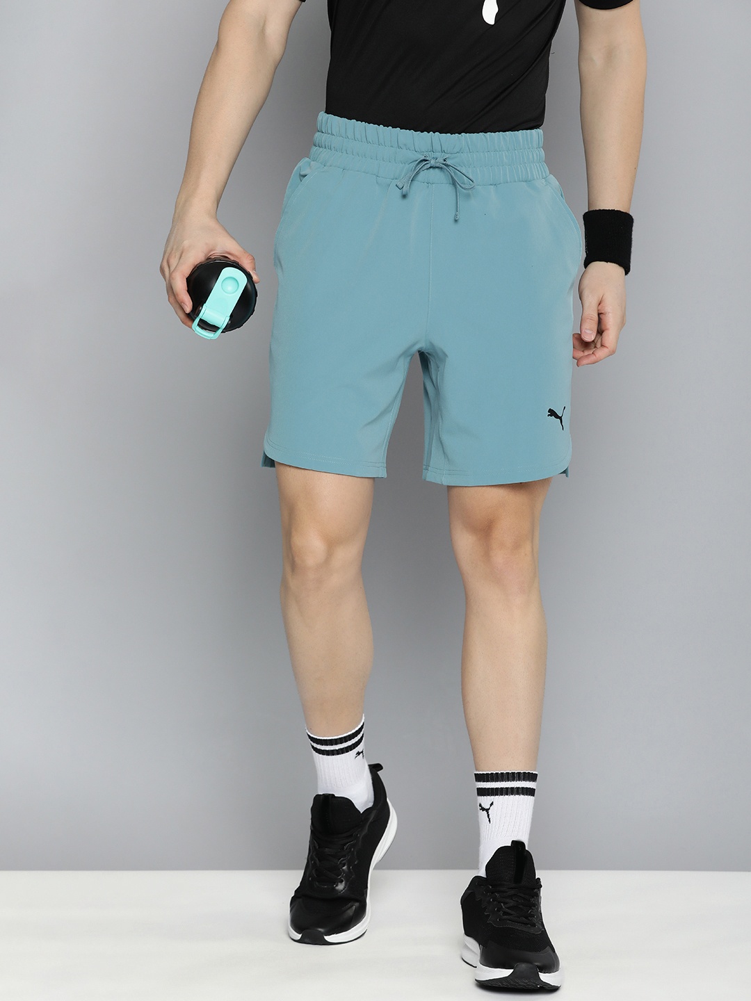 

Puma Men drycell Solid Studio Ultramove Mid-Rise Shorts, Blue