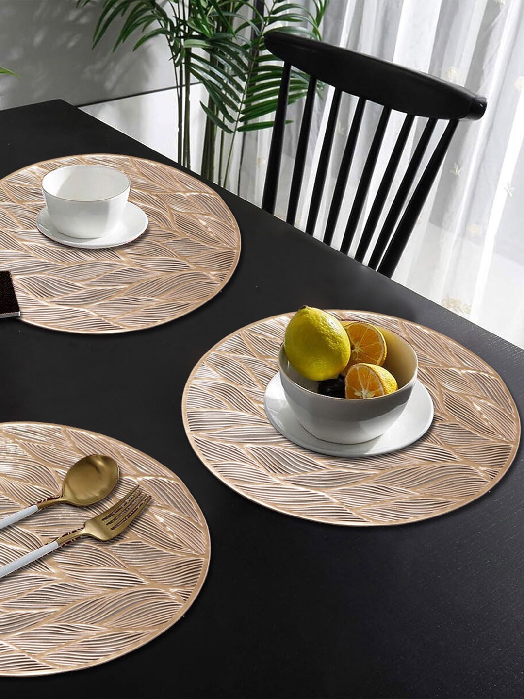 

Dakshya Industries Beige 4 Pieces Textured Round Table Placemats