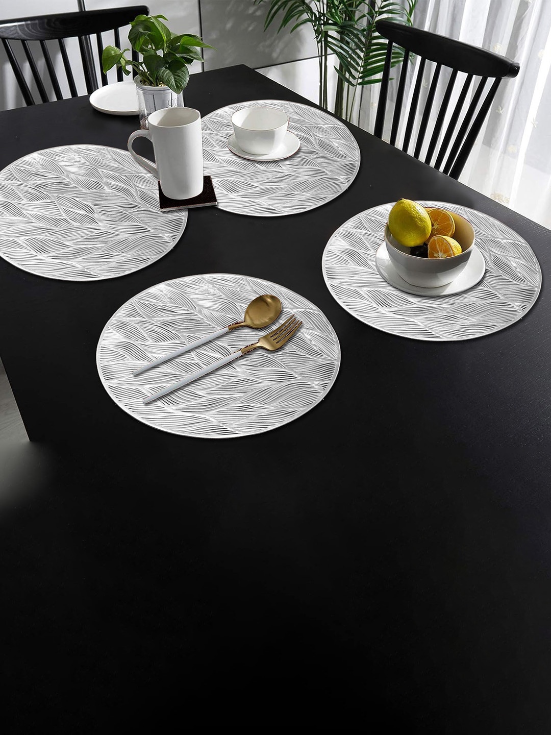

Dakshya Industries Silver-Colored 2-Pieces Textured Round Table Placemats