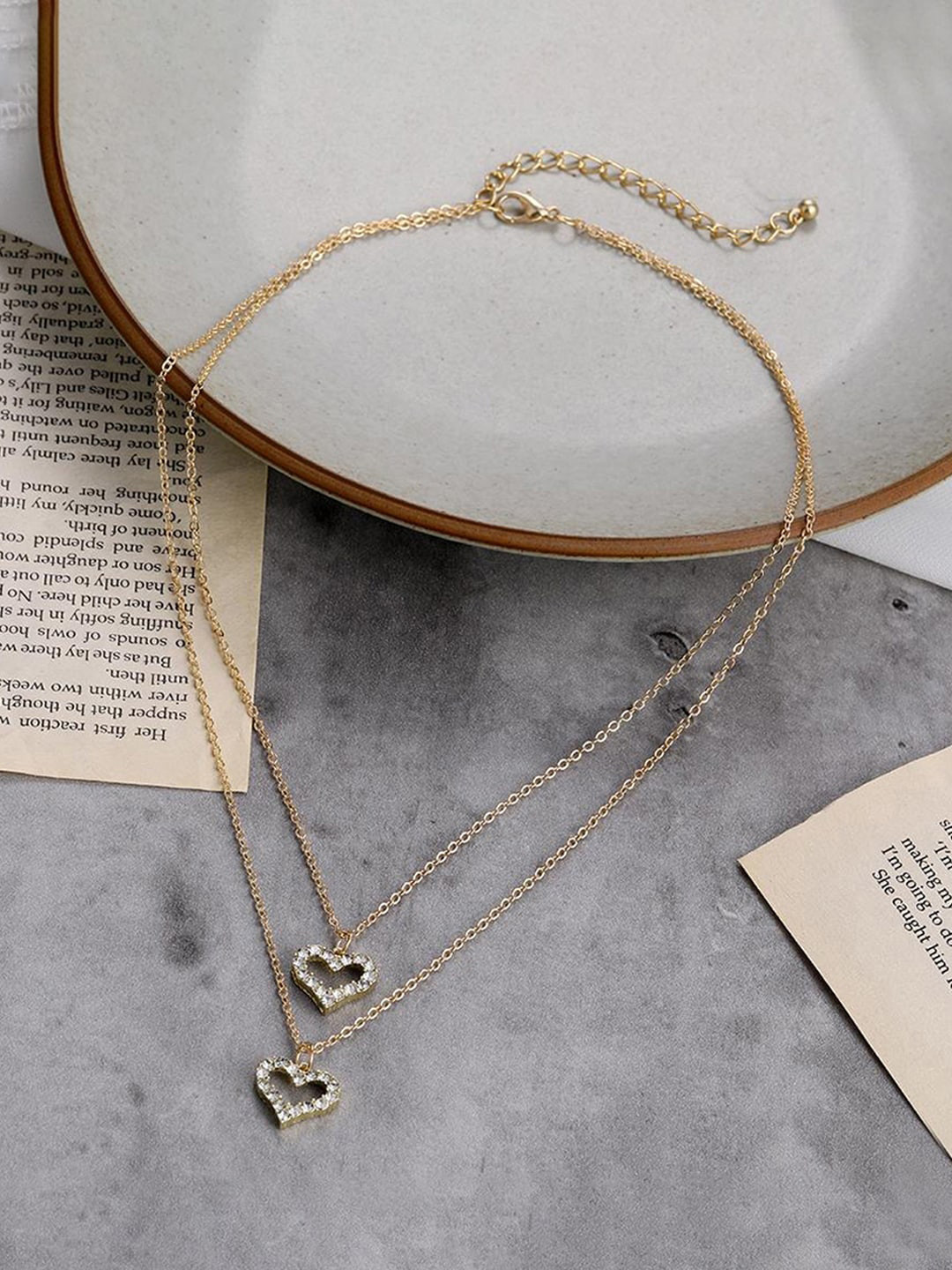 

Jewels Galaxy Gold-Plated AD-Studded & Dual Heart-Charm Pendant With Layered Chain