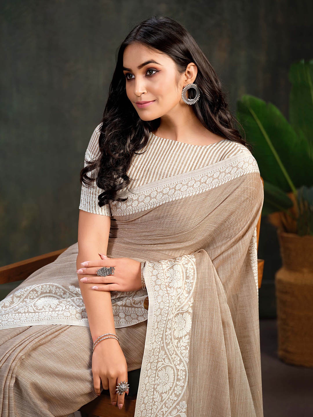 

Sangria Beige & White Striped Woven Design Border Saree