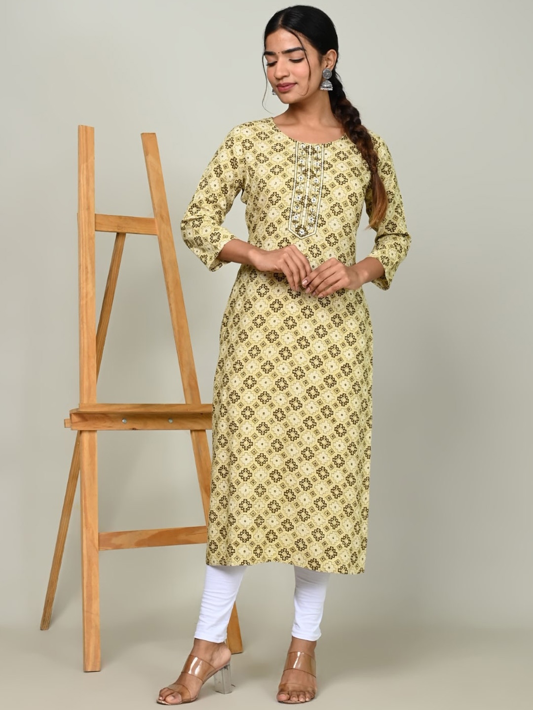 

Nishika Ethnic Motifs Printed Thread Work Detailed Straight Kurta, Yellow