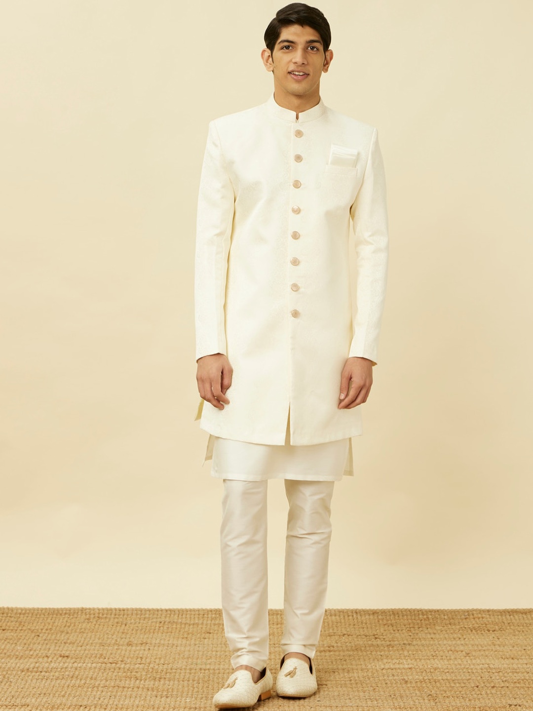 

Manyavar Traditional Indo Western Brocade Sherwani Set, Off white