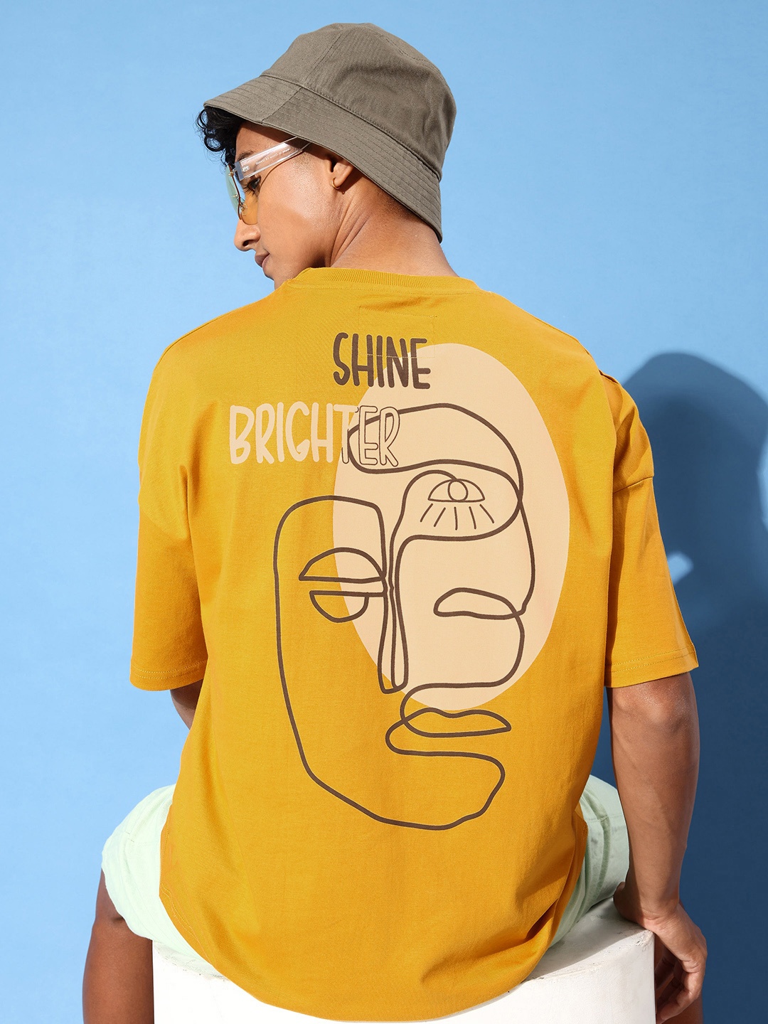 

Stormborn Men Graphic Printed Drop-Shoulder Sleeves Oversized Pure Cotton T-shirt, Mustard