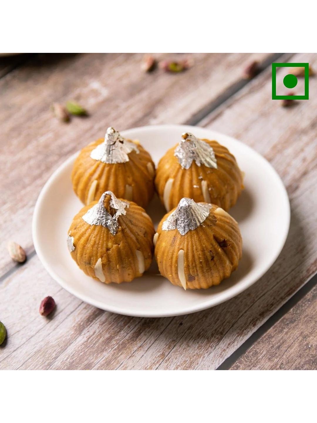 

The Baklava Box Besan Pista Modak -500gm, Yellow