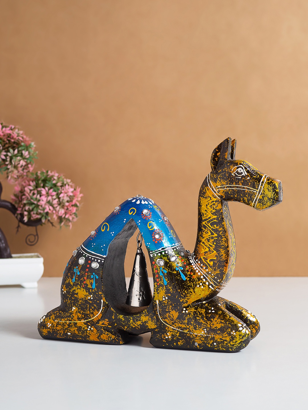 

Golden Peacock Yellow & Blue Camel Figurine Showpiece