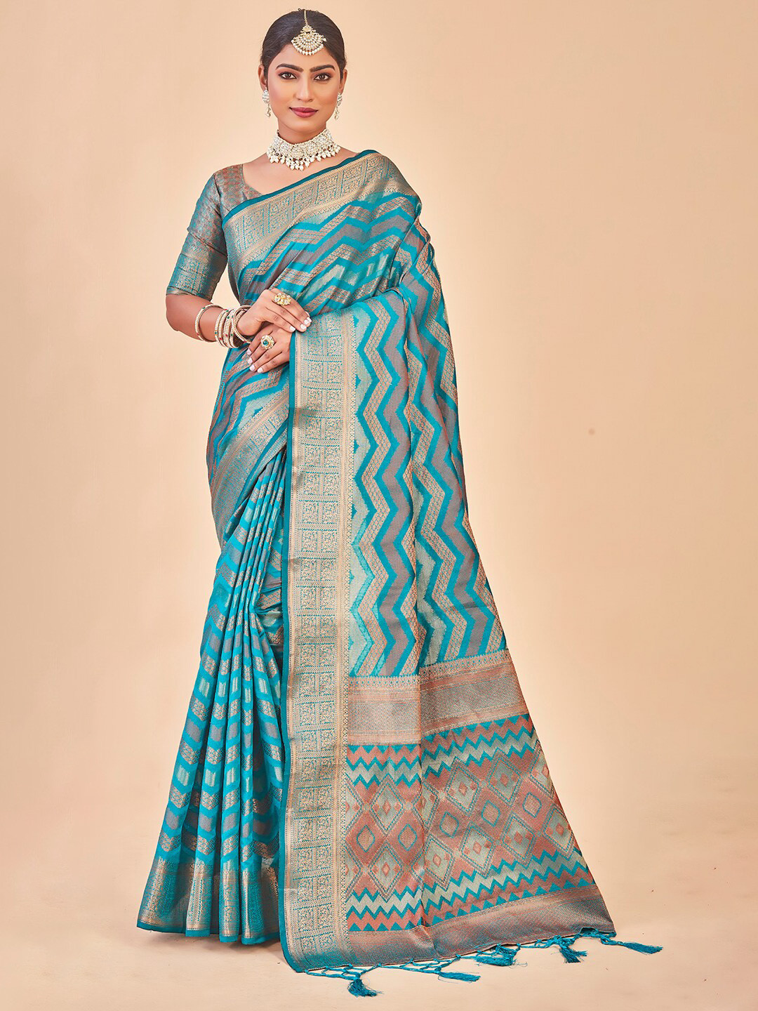 

Anouk Turquoise Blue & Pink Ethnic Motif Woven Design Zari Organza Saree