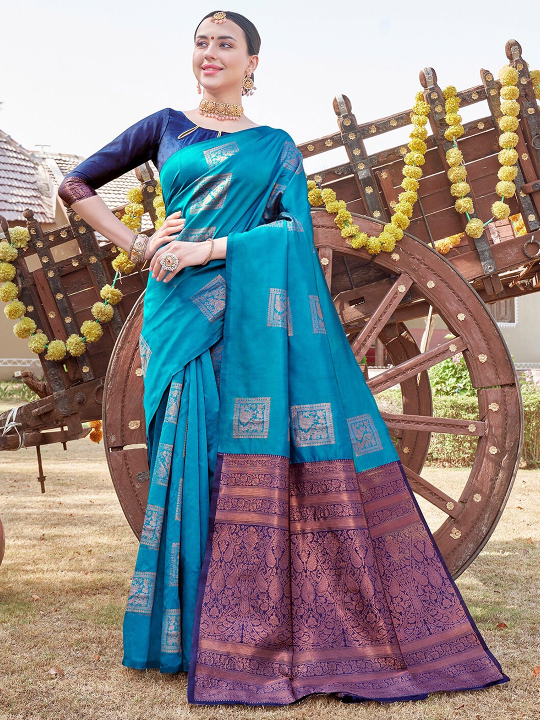 

Anouk Rustic Ethnic Motifs Woven Design Zari Organza Saree, Turquoise blue