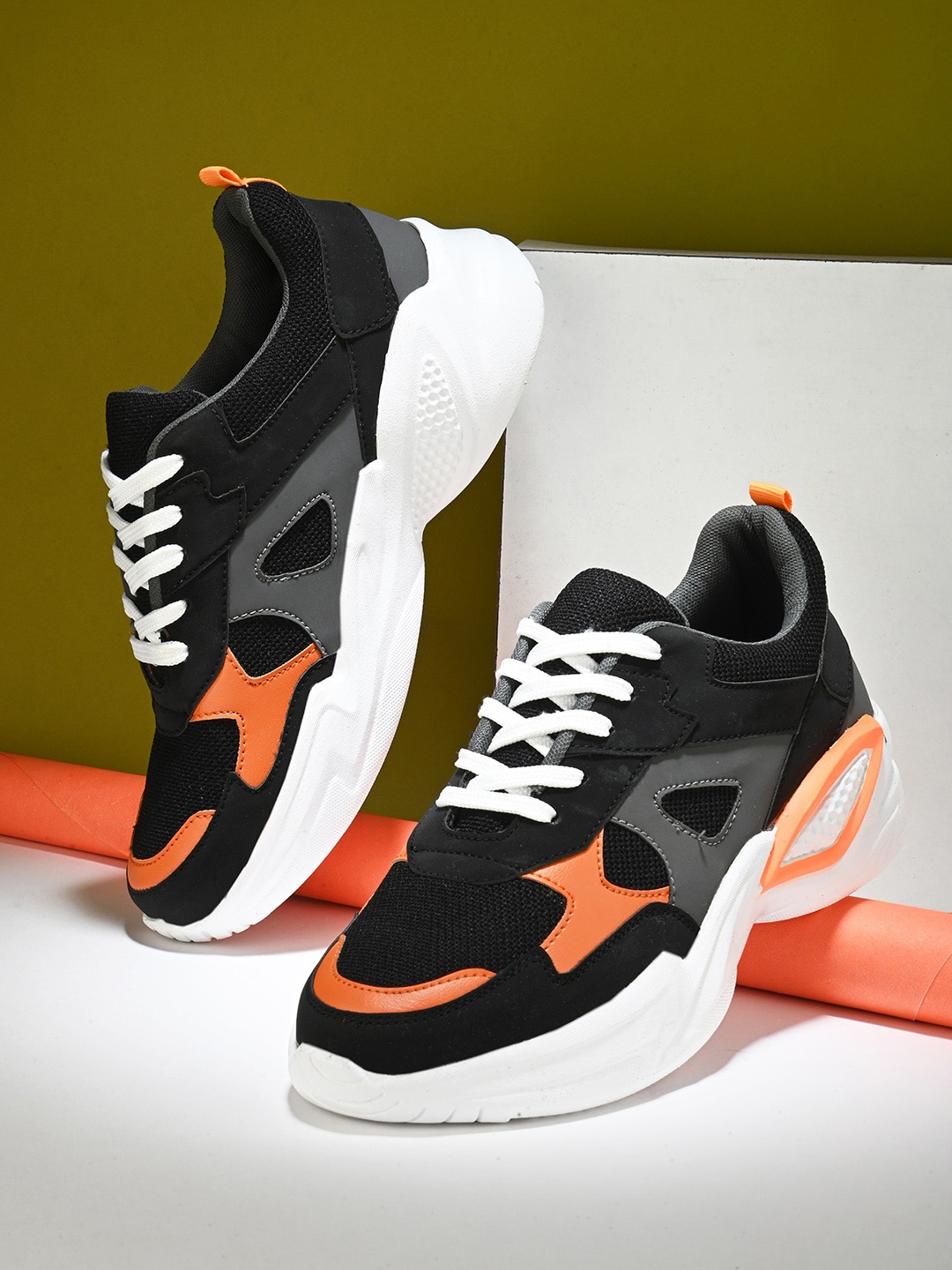 

The Roadster Lifestyle Co. Men Black & Orange Colourblocked Lightweight Sneakers