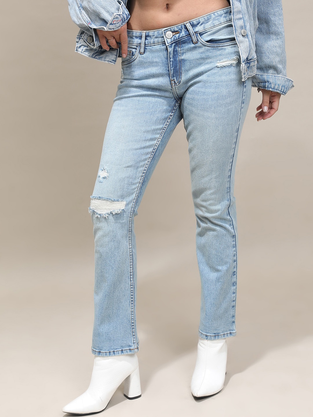 

Tokyo Talkies Women Bootcut Mildly Distressed Light Fade Stretchable Jeans, Blue